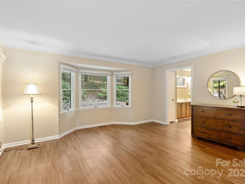 131 Jenny Lind Drive, Hendersonville, NC 28791.  MLS# CAR4294642, YatesRealty ID 35033. Owner's Bedroom
