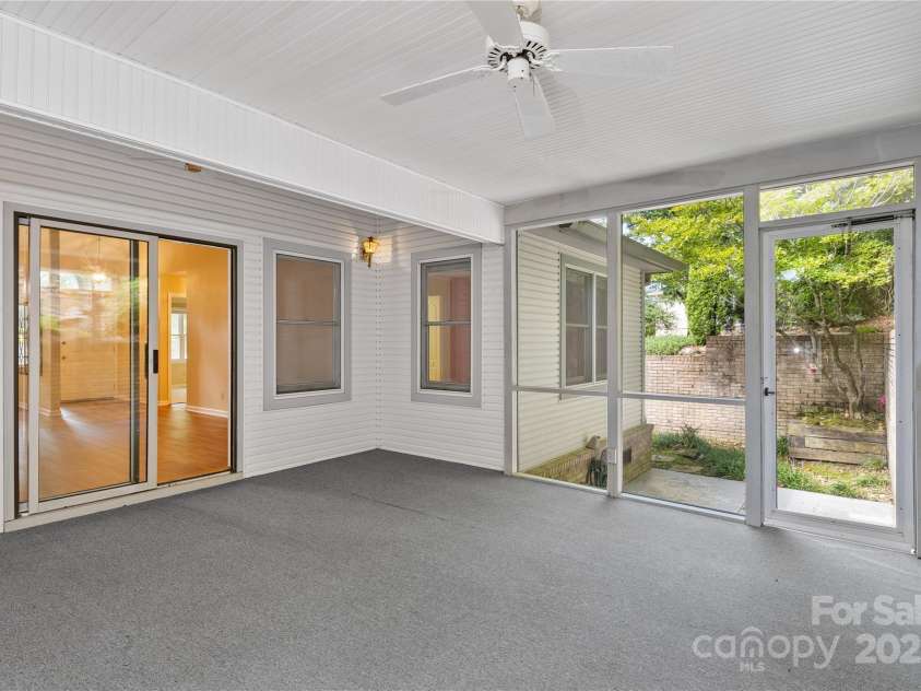 131 Jenny Lind Drive, Hendersonville, NC 28791.  MLS# CAR4294642, YatesRealty ID 35033. Screen Porch