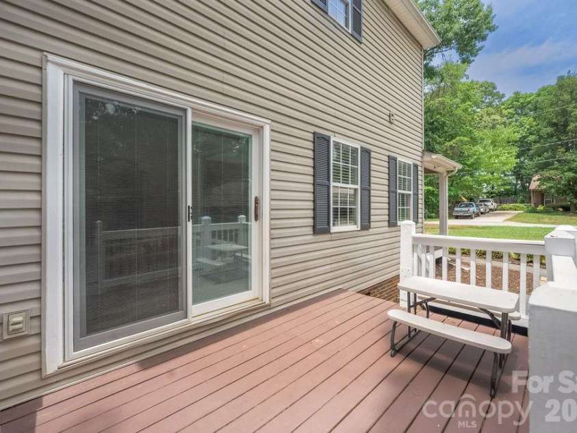 7734 Red Robin Trail, Denver, NC 28037.  MLS# CAR4398482, YatesRealty ID 35033. Deck off Dining Room leading to Patio