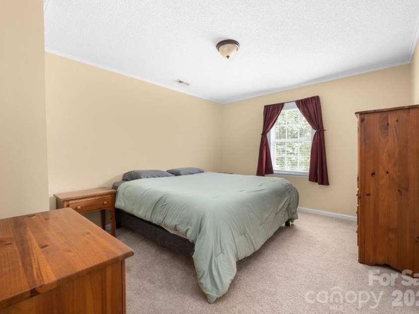 7734 Red Robin Trail, Denver, NC 28037.  MLS# CAR4398482, YatesRealty ID 35033. Primary Bedroom with Spacious Walk-in Closet