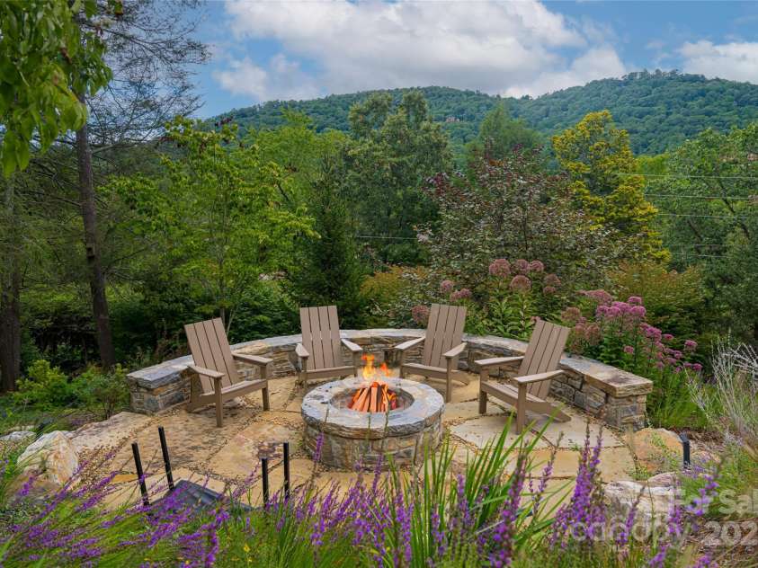80 Kimberly Knoll Road, Asheville, NC 28804.  MLS# CAR4275443, YatesRealty ID 35034. Firepit