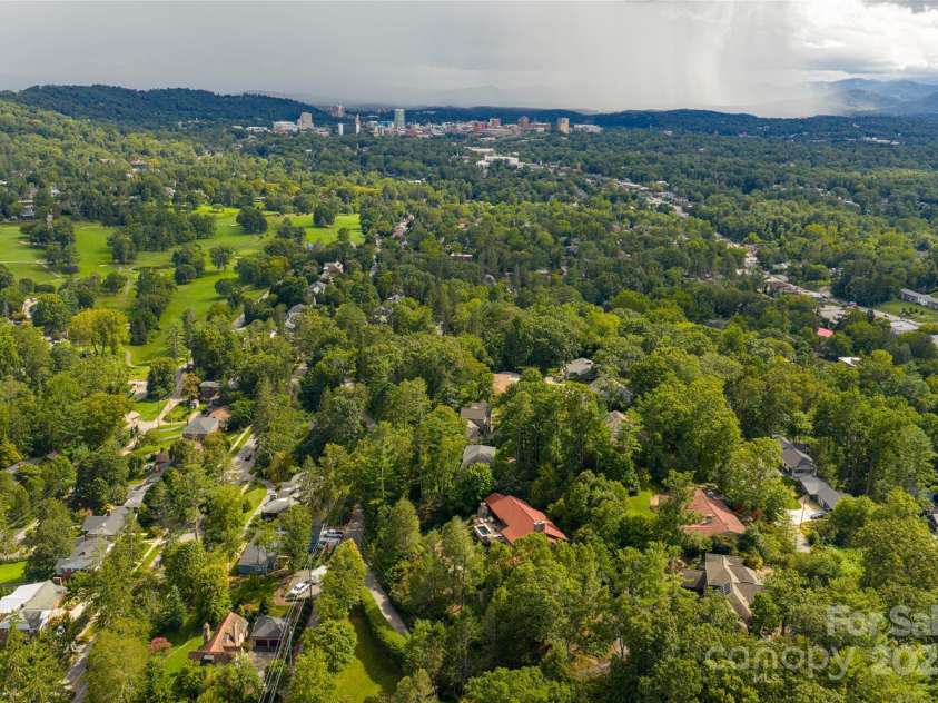 80 Kimberly Knoll Road, Asheville, NC 28804.  MLS# CAR4275443, YatesRealty ID 35034. In the middle of it all...