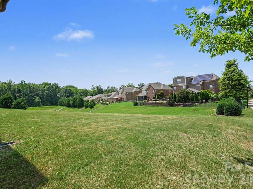 3605 Jumprock Road, Fort Mill, SC 29707.  MLS# CAR4391243, YatesRealty ID 35037. Level backyard!