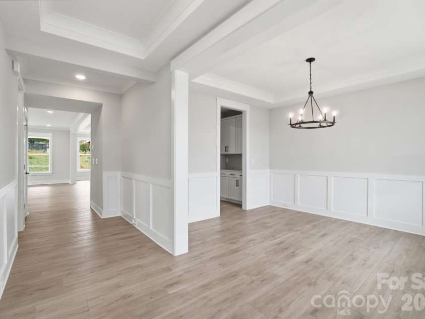 7144 Bil-Mar Drive, Harrisburg, NC 28075.  MLS# CAR4330715, YatesRealty ID 35039. Entryway and Dining Room