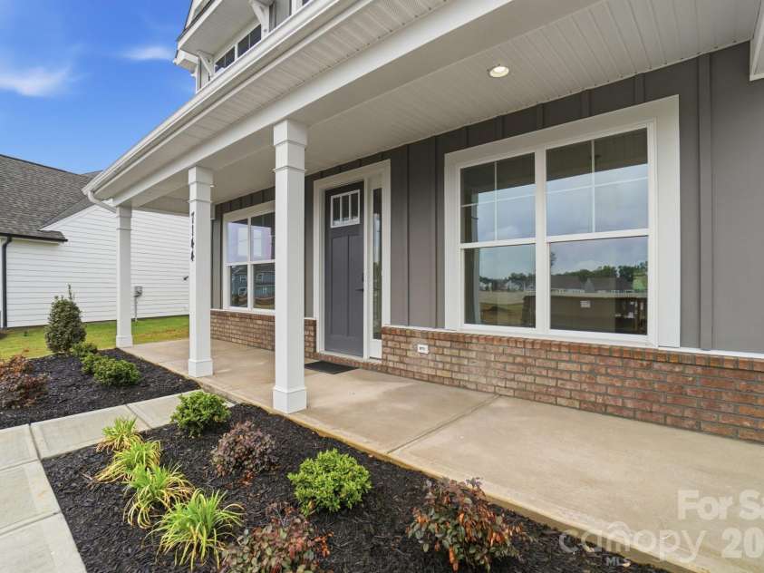 7144 Bil-Mar Drive, Harrisburg, NC 28075.  MLS# CAR4330715, YatesRealty ID 35039. Front porch