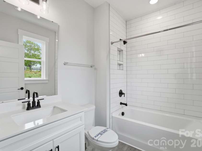 7144 Bil-Mar Drive, Harrisburg, NC 28075.  MLS# CAR4330715, YatesRealty ID 35039. Guest Bath