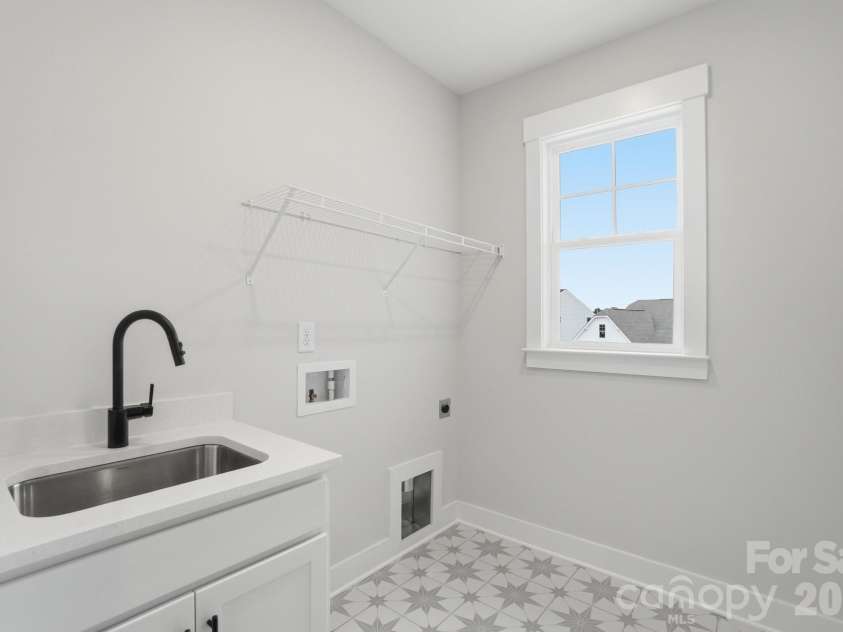 7144 Bil-Mar Drive, Harrisburg, NC 28075.  MLS# CAR4330715, YatesRealty ID 35039. Laundry Room