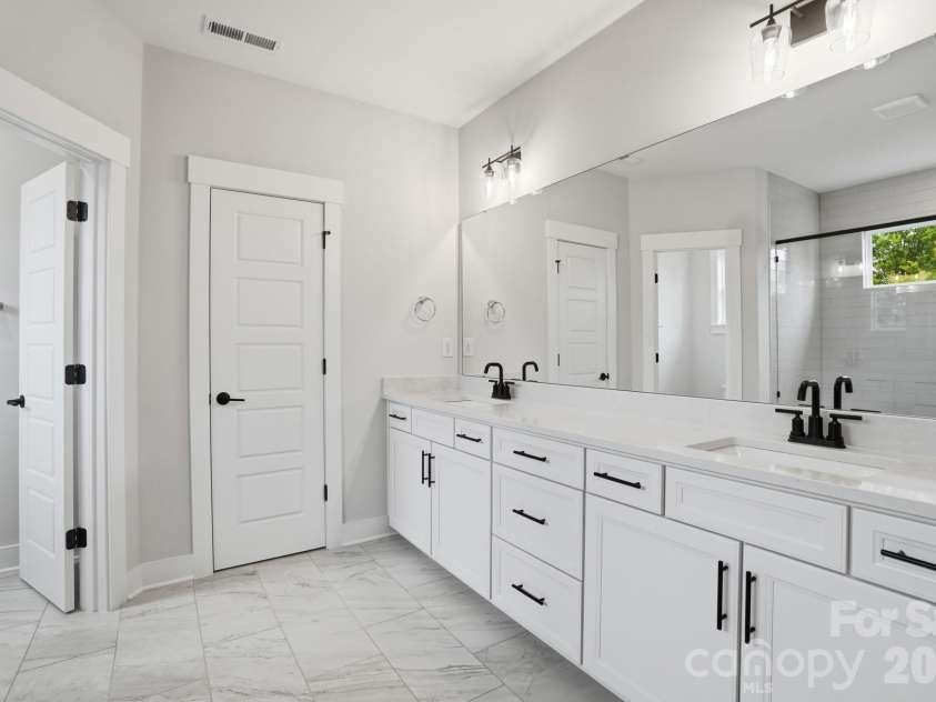 7144 Bil-Mar Drive, Harrisburg, NC 28075.  MLS# CAR4330715, YatesRealty ID 35039. Primary Bathroom