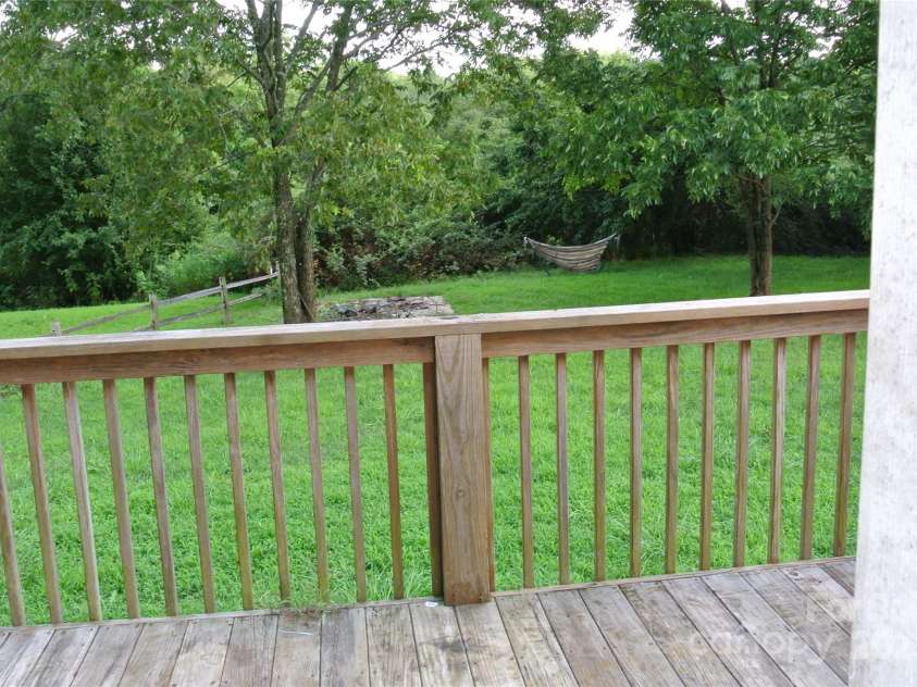 125 Faye Toney Road, Mooresboro, NC 28114.  MLS# CAR4292474, YatesRealty ID 35048. Back Lawn