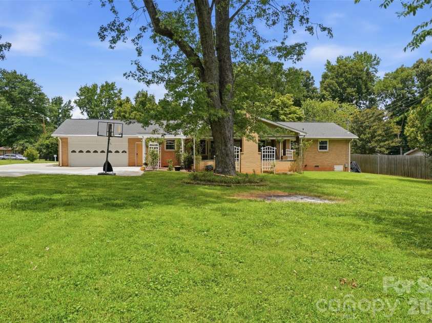 6108 Mallard Drive, Charlotte, NC 28227.  MLS# CAR4396420, YatesRealty ID 35051. Back Load Two-Car Garage