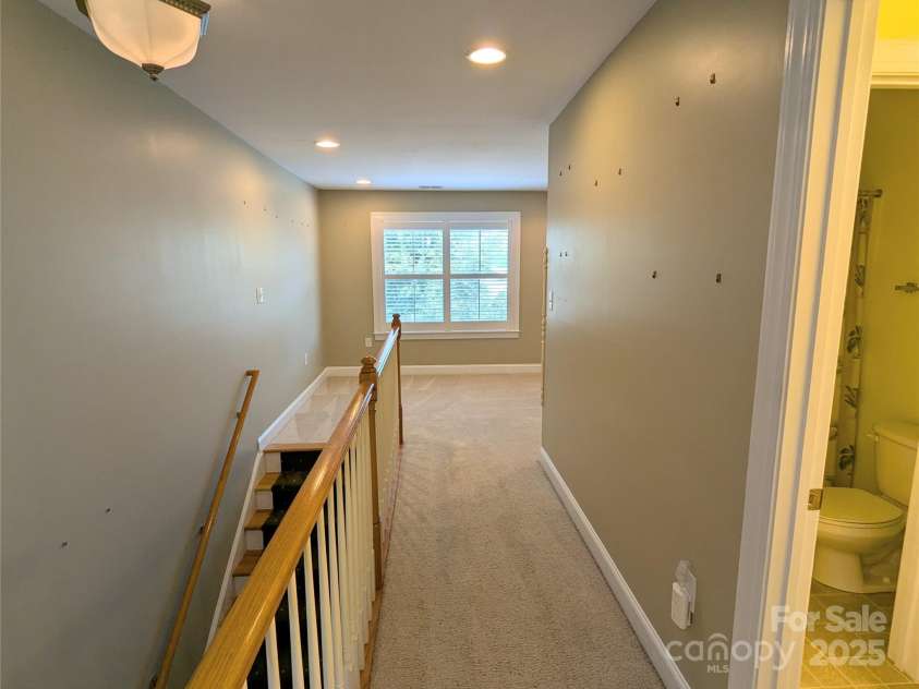 4416 Sages Avenue, Indian Trail, NC 28079.  MLS# CAR4293397, YatesRealty ID 35052. Hall from loft to bedrooms