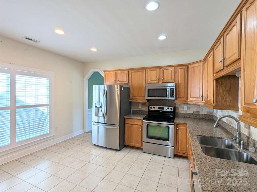 4416 Sages Avenue, Indian Trail, NC 28079.  MLS# CAR4293397, YatesRealty ID 35052. Kitchen has lots of Natural Sunlight