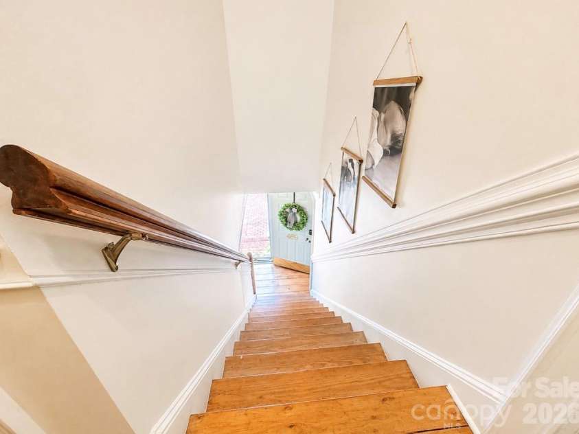 469 Augusta Drive, Statesville, NC 28625.  MLS# CAR4391486, YatesRealty ID 35053. Hall staircase