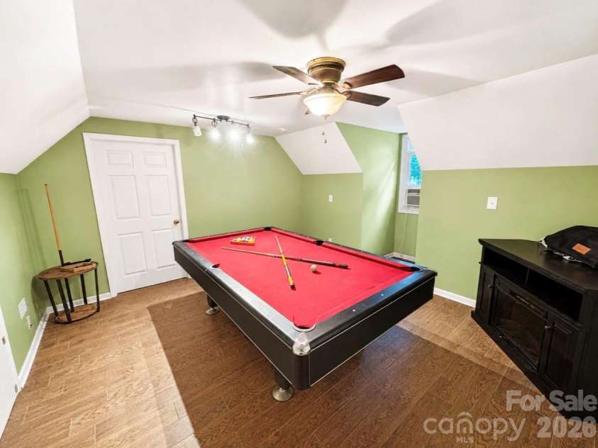 469 Augusta Drive, Statesville, NC 28625.  MLS# CAR4391486, YatesRealty ID 35053. Over garage extra space/ studio/ office