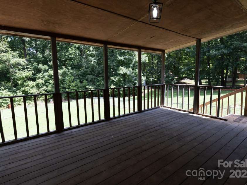 205 Dana Drive, Salisbury, NC 28147.  MLS# CAR4288780, YatesRealty ID 35059. Extra large covered back deck