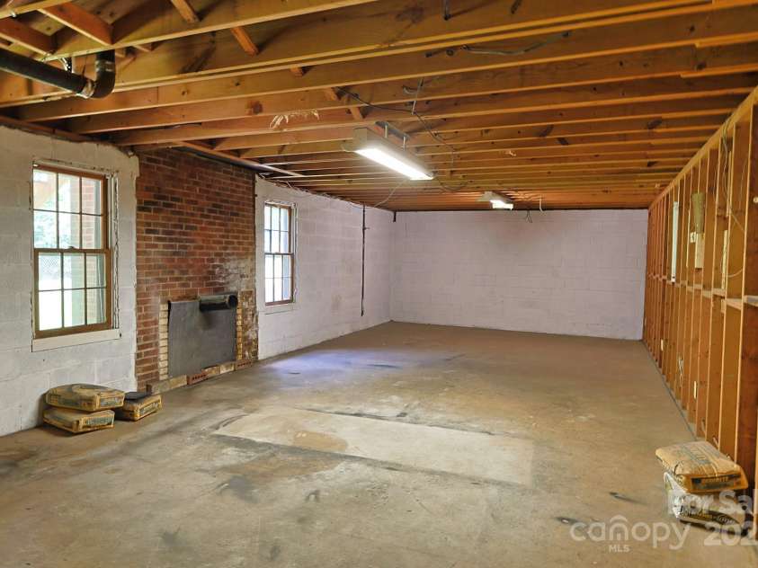 205 Dana Drive, Salisbury, NC 28147.  MLS# CAR4288780, YatesRealty ID 35059. Large unfinished basement with lots of storage. could be used for so many ideas...