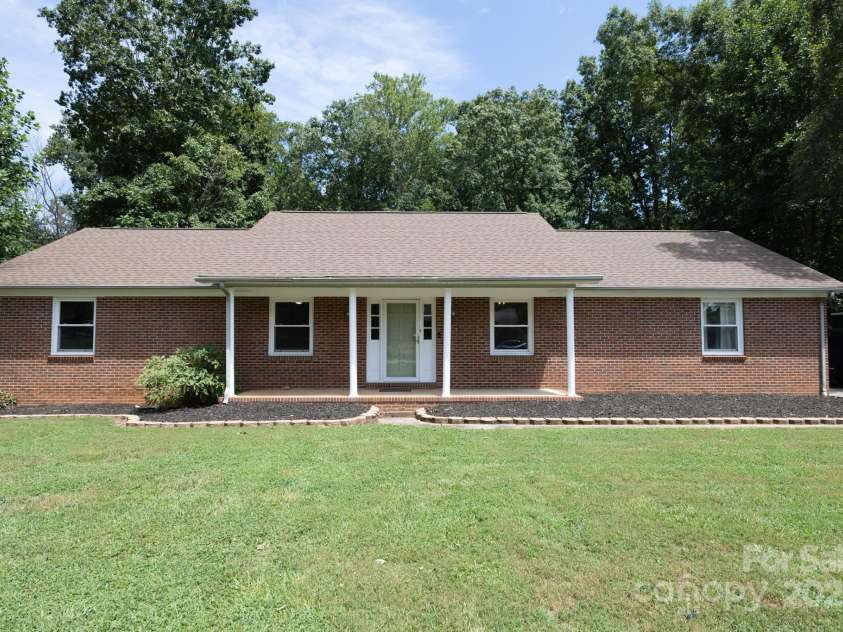205 Dana Drive, Salisbury, NC 28147.  MLS# CAR4288780, YatesRealty ID 35059. Lovely Brick Home with new roof and heating and air system newer hot water heater shop with electric