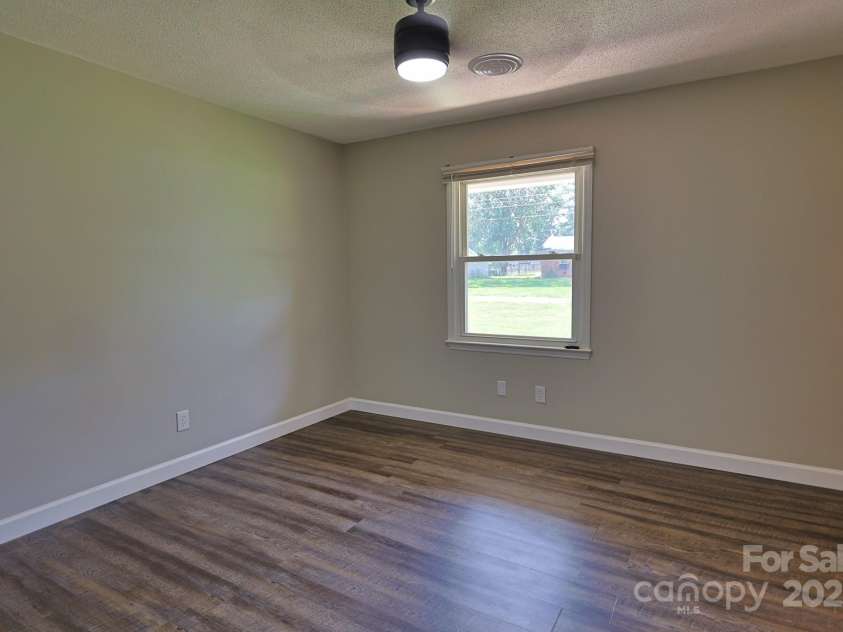 205 Dana Drive, Salisbury, NC 28147.  MLS# CAR4288780, YatesRealty ID 35059. Secondary bedroom with lvp flooring