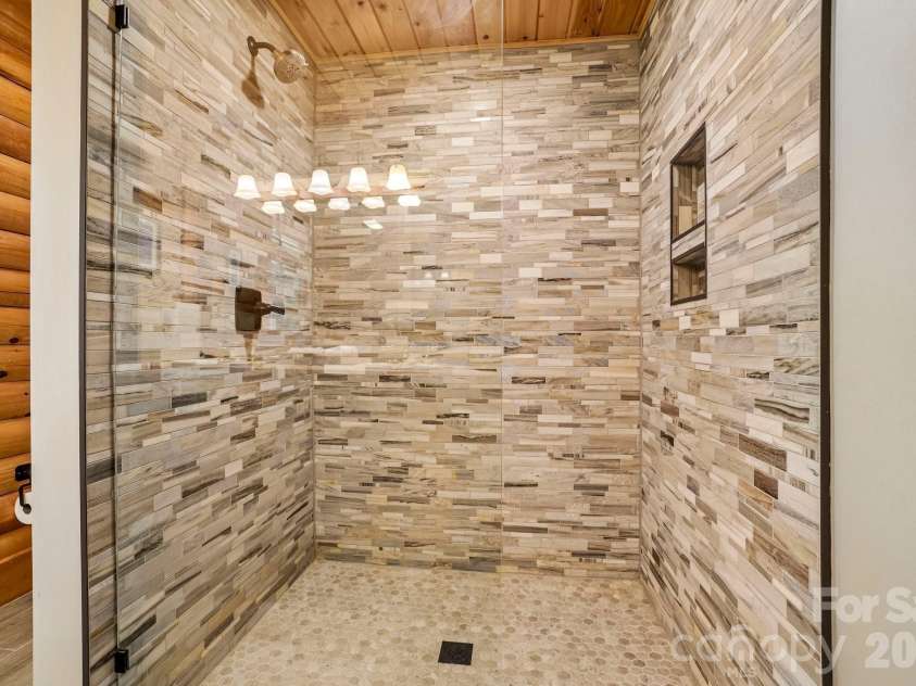469 Tearshirt Lane, Mars Hill, NC 28754.  MLS# CAR4399625, YatesRealty ID 35059. Custom Tile Shower
