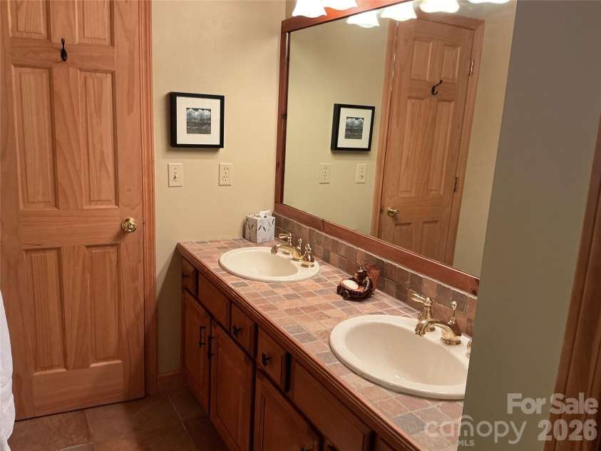 469 Tearshirt Lane, Mars Hill, NC 28754.  MLS# CAR4399625, YatesRealty ID 35059. Custom Tiled Showers