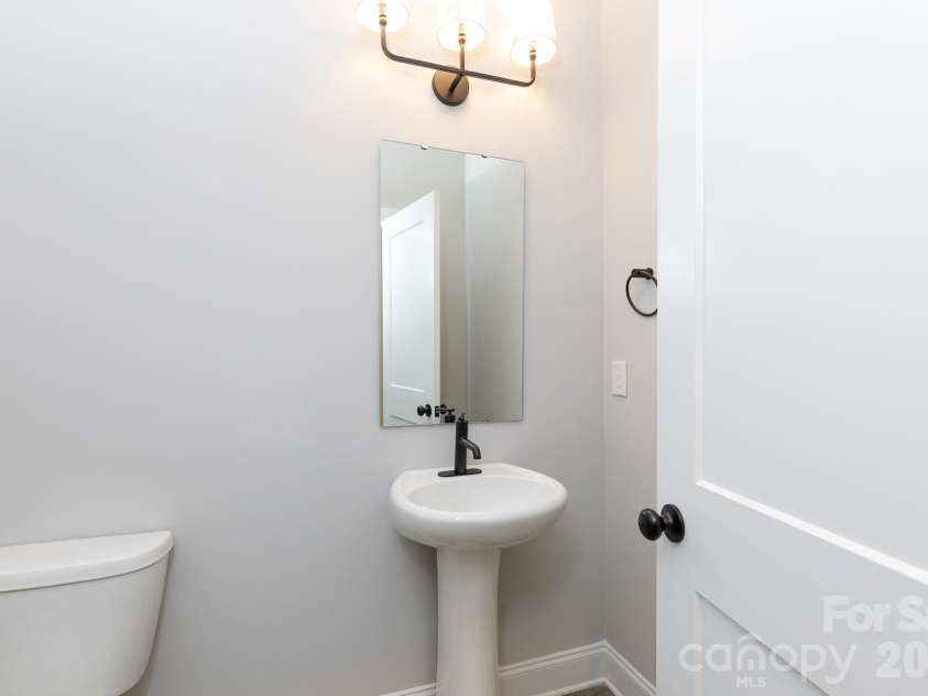 502 Squaw Lane, Edgemoor, SC 29712.  MLS# CAR4342690, YatesRealty ID 3506. 1/2 Bath located off the kitchen area.