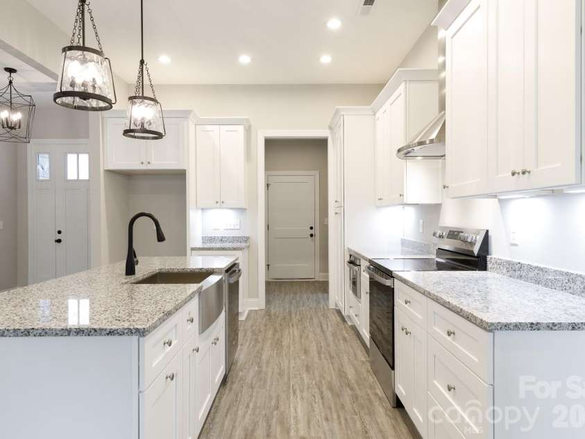 502 Squaw Lane, Edgemoor, SC 29712.  MLS# CAR4342690, YatesRealty ID 3506. Garage entrance is located off the kitchen through the hall.