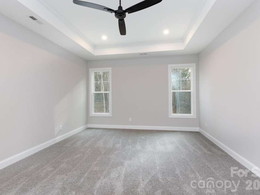 502 Squaw Lane, Edgemoor, SC 29712.  MLS# CAR4342690, YatesRealty ID 3506. Primary bedroom with plenty of natural light.