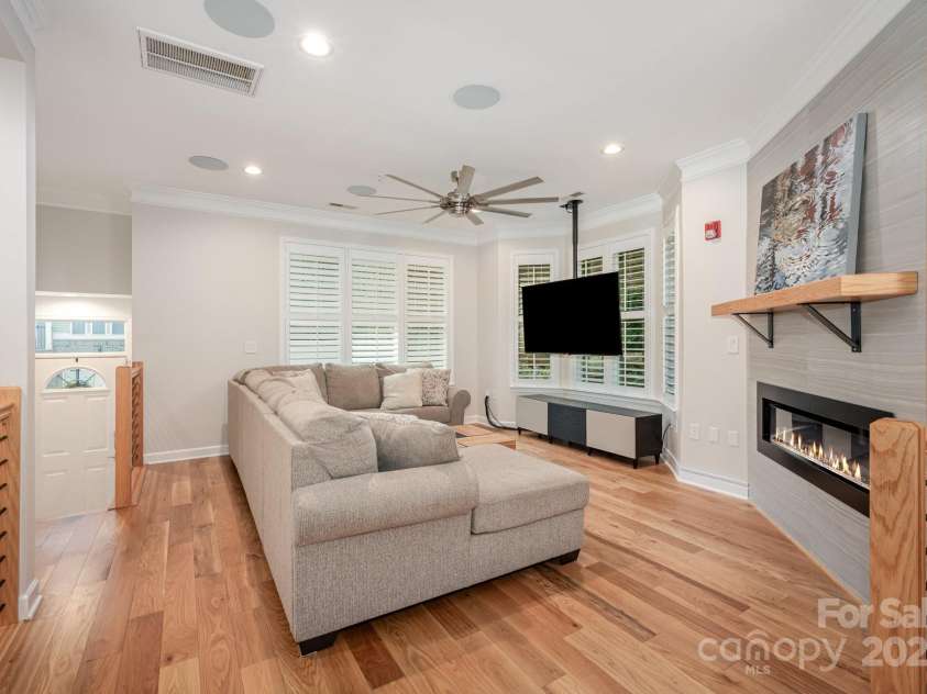 7103 Founders Club Court, Charlotte, NC 28269.  MLS# CAR4294615, YatesRealty ID 35061. Gorgeous wood floors, custom railings, and surround sound throughout the home
