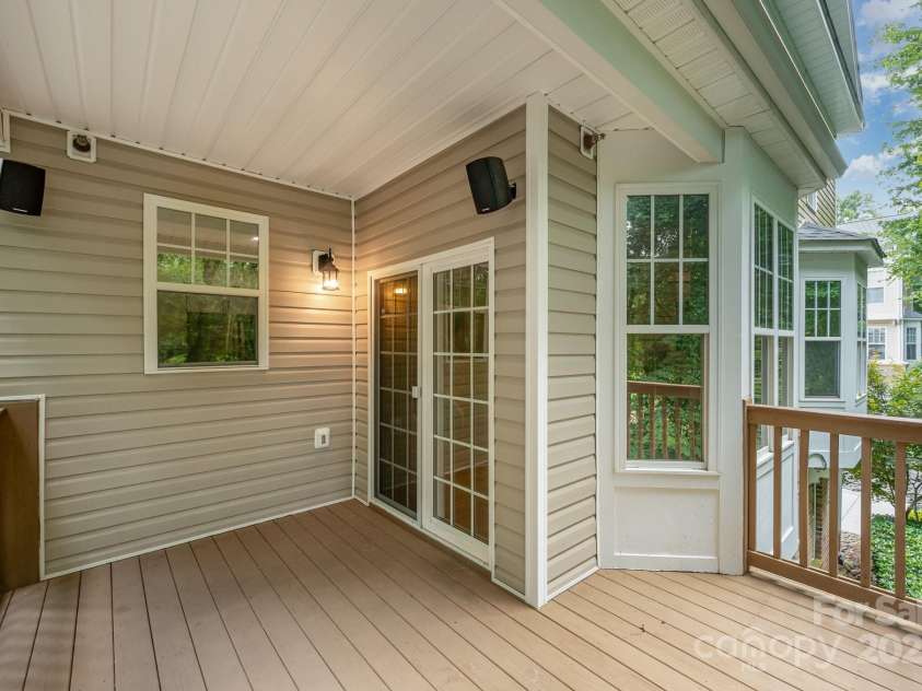 7103 Founders Club Court, Charlotte, NC 28269.  MLS# CAR4294615, YatesRealty ID 35061. Large covered balcony on the main floor