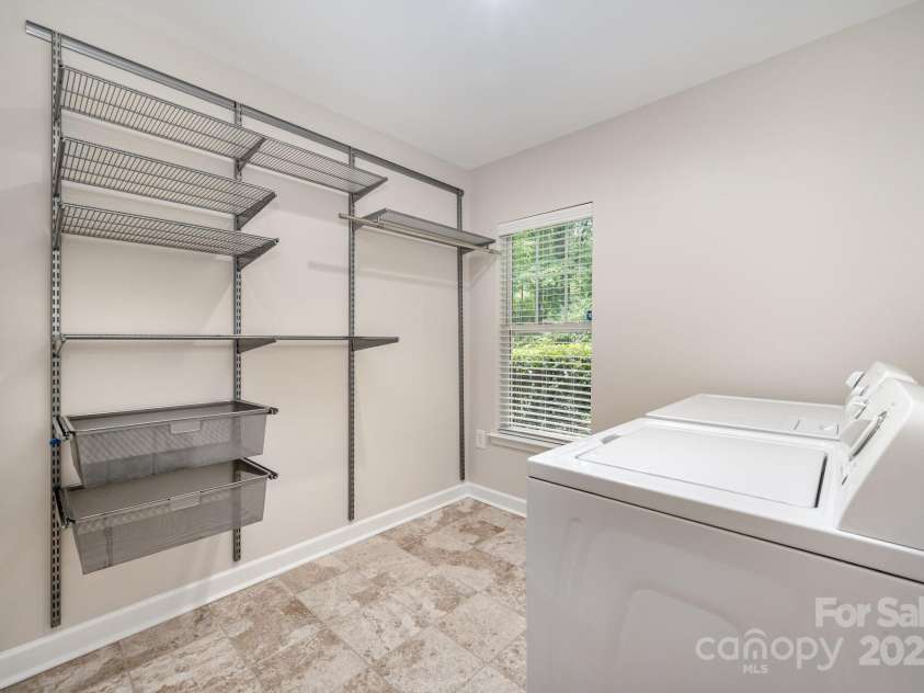 7103 Founders Club Court, Charlotte, NC 28269.  MLS# CAR4294615, YatesRealty ID 35061. Lower Level Laundry Room