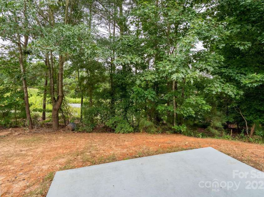 2496 Bergamot Street, Tega Cay, SC 29708.  MLS# CAR4288569, YatesRealty ID 35064. Back yard