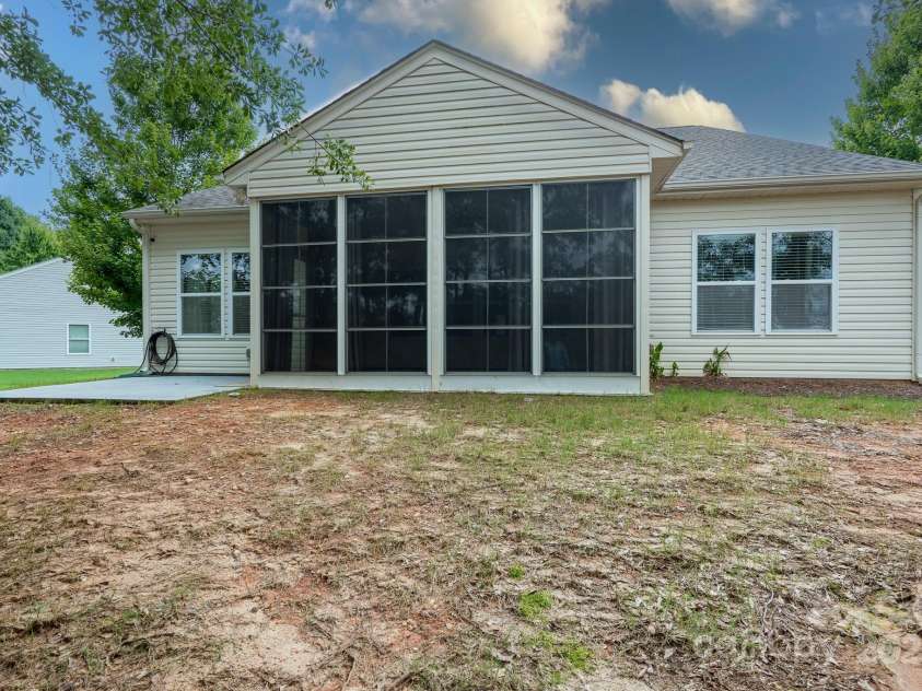 2496 Bergamot Street, Tega Cay, SC 29708.  MLS# CAR4288569, YatesRealty ID 35064. Enclosed sunroom