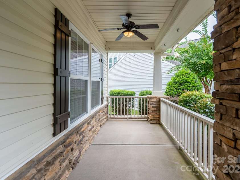 2496 Bergamot Street, Tega Cay, SC 29708.  MLS# CAR4288569, YatesRealty ID 35064. Front covered porch