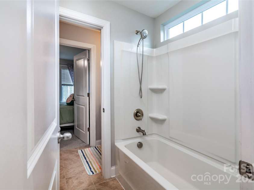 7052 Barnstone Court, Denver, NC 28037.  MLS# CAR4295531, YatesRealty ID 35068. Bedroom 4 & 5 Jack and Jill Shower and Toilet