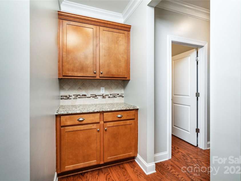 7052 Barnstone Court, Denver, NC 28037.  MLS# CAR4295531, YatesRealty ID 35068. Butler's Pantry connecting to dining room