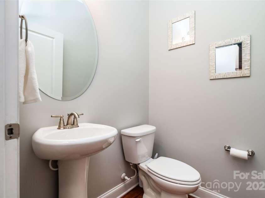 7052 Barnstone Court, Denver, NC 28037.  MLS# CAR4295531, YatesRealty ID 35068. Half bath off the main level hallway