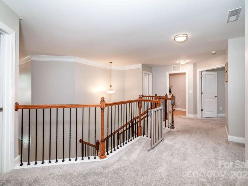 7052 Barnstone Court, Denver, NC 28037.  MLS# CAR4295531, YatesRealty ID 35068. Upstairs Hallway