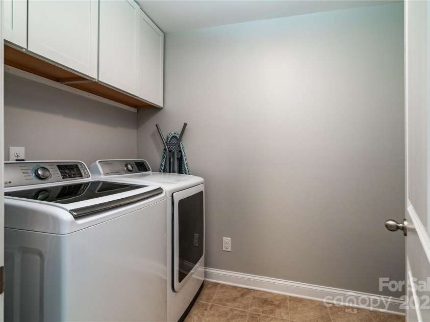 7052 Barnstone Court, Denver, NC 28037.  MLS# CAR4295531, YatesRealty ID 35068. Upstairs Laundry Room