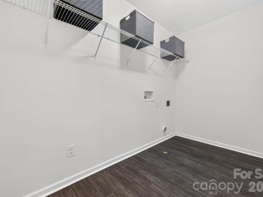 12551 Gotland Road, Midland, NC 28107.  MLS# CAR4396303, YatesRealty ID 35069. Oversized Laundry Room on 2nd floor w shelving - 57 square feet