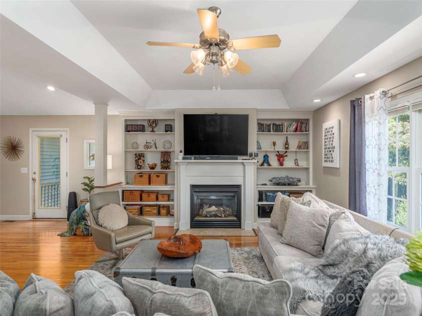 105 Deer Glade Lane, Waynesville, NC 28786.  MLS# CAR4296932, YatesRealty ID 35070. Fireplace and built-ins