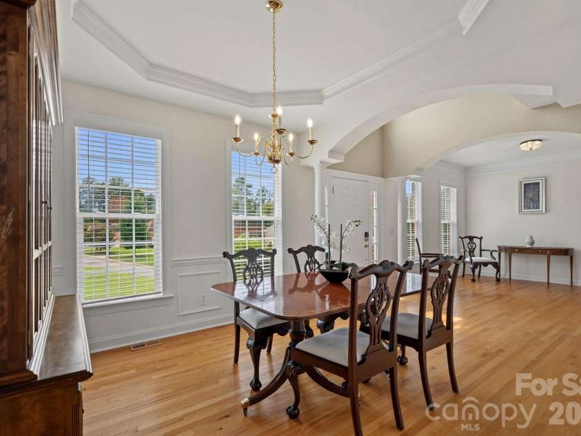 9329 Uxbridge Lane, Huntersville, NC 28078.  MLS# CAR4390100, YatesRealty ID 35071. Dining area looking into entry and office/flex space