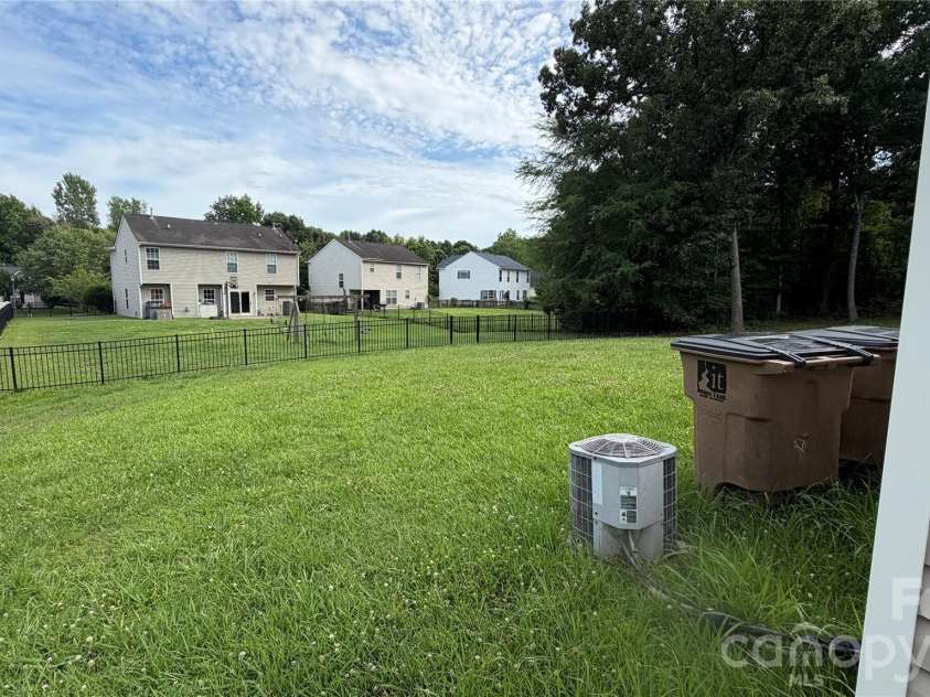 1005 LadyBank Court, Indian Trail, NC 28079.  MLS# CAR4320578, YatesRealty ID 35072. Side of house view