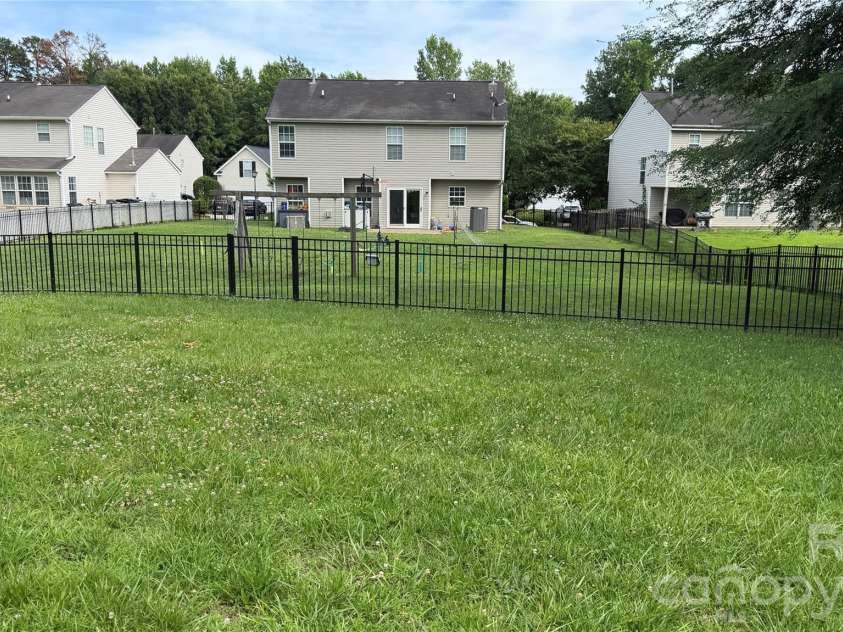 1005 LadyBank Court, Indian Trail, NC 28079.  MLS# CAR4320578, YatesRealty ID 35072. Spacious backyard