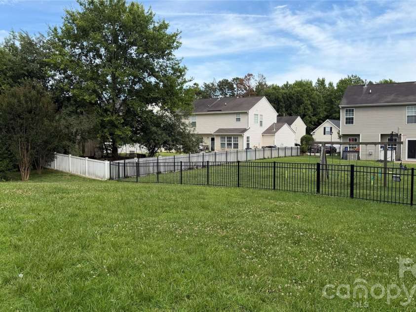 1005 LadyBank Court, Indian Trail, NC 28079.  MLS# CAR4320578, YatesRealty ID 35072. Spacious backyard