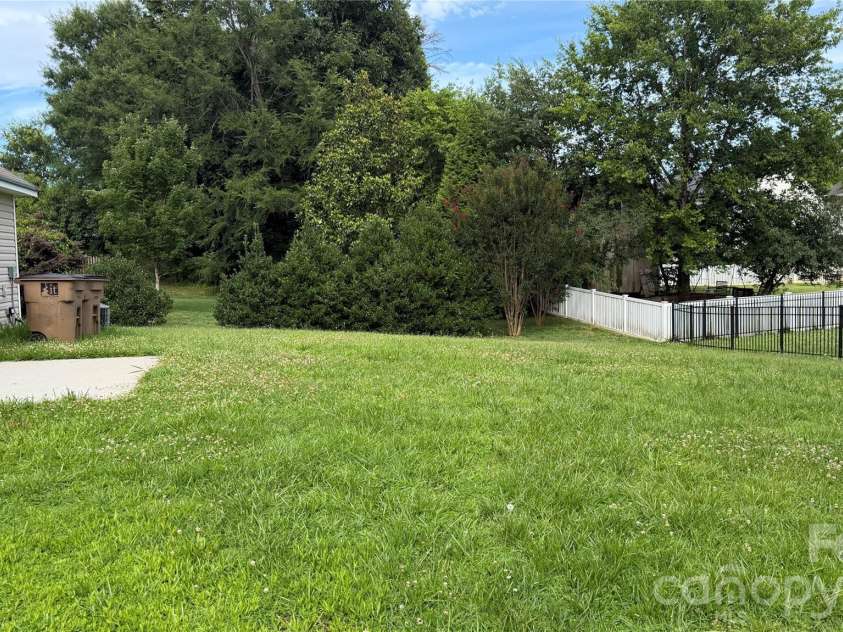 1005 LadyBank Court, Indian Trail, NC 28079.  MLS# CAR4320578, YatesRealty ID 35072. Spacious backyard