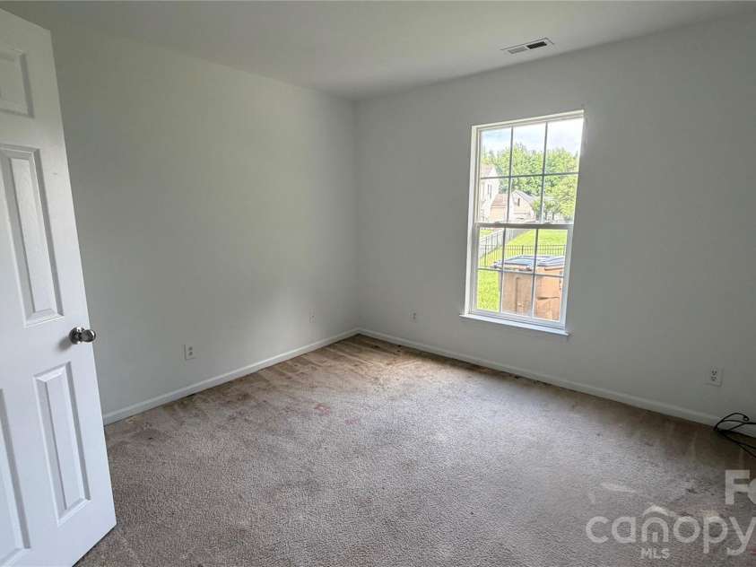 1005 LadyBank Court, Indian Trail, NC 28079.  MLS# CAR4320578, YatesRealty ID 35072. Third Bedroom Front Viwe
