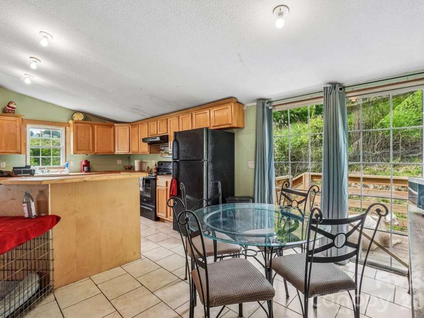 400 Morgan Branch Road, Marshall, NC 28753.  MLS# CAR4395318, YatesRealty ID 35075. 