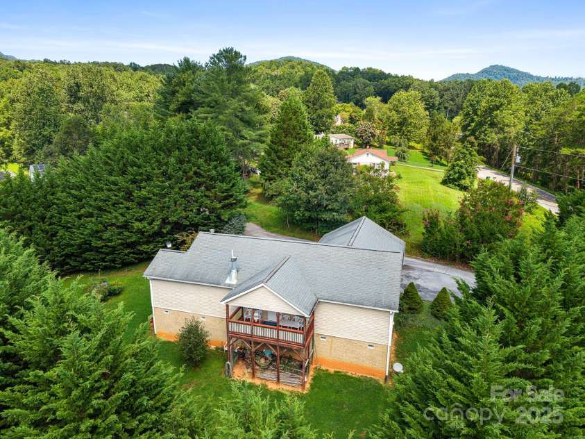 105 Robinson Cove Road, Candler, NC 28715.  MLS# CAR4293915, YatesRealty ID 35076. 