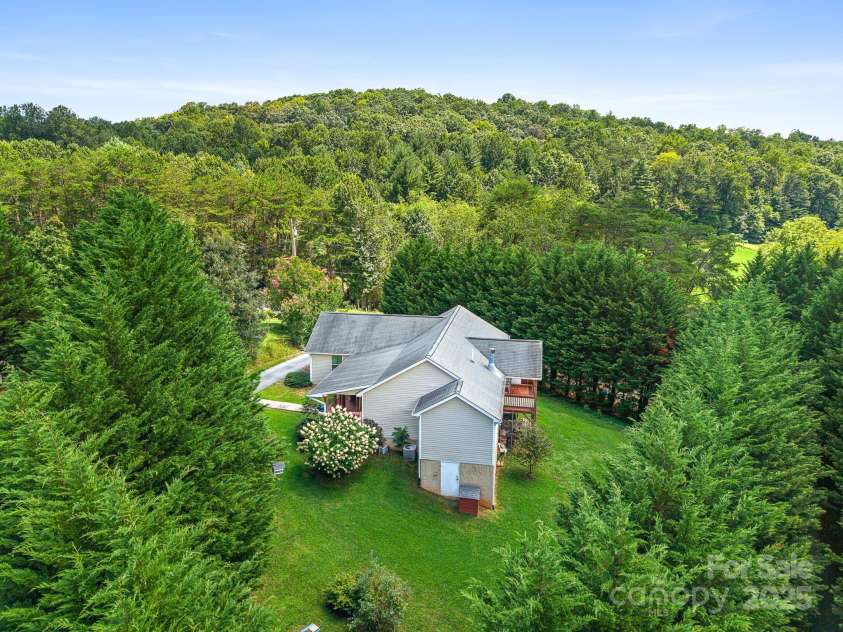 105 Robinson Cove Road, Candler, NC 28715.  MLS# CAR4293915, YatesRealty ID 35076. 