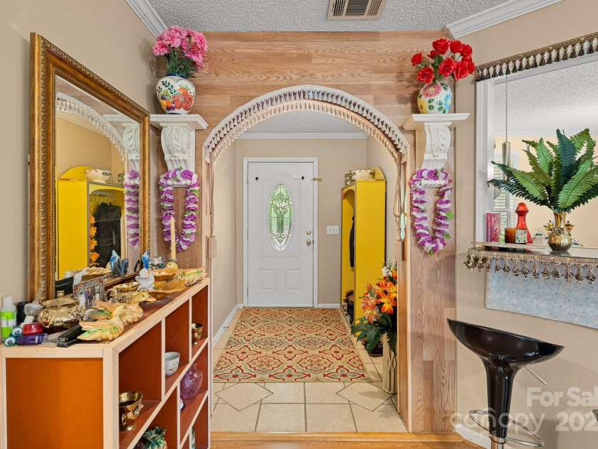 105 Robinson Cove Road, Candler, NC 28715.  MLS# CAR4293915, YatesRealty ID 35076. Front entrance